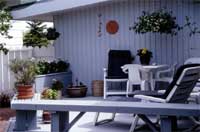 You can make the most of the available space on balconies and verandahs by installing hanging baskets