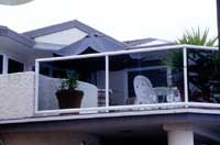 If your balcony is enclosed by glass panels, you will have to work out a balance between privacy and light penetration