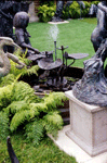 Bronze statues with water